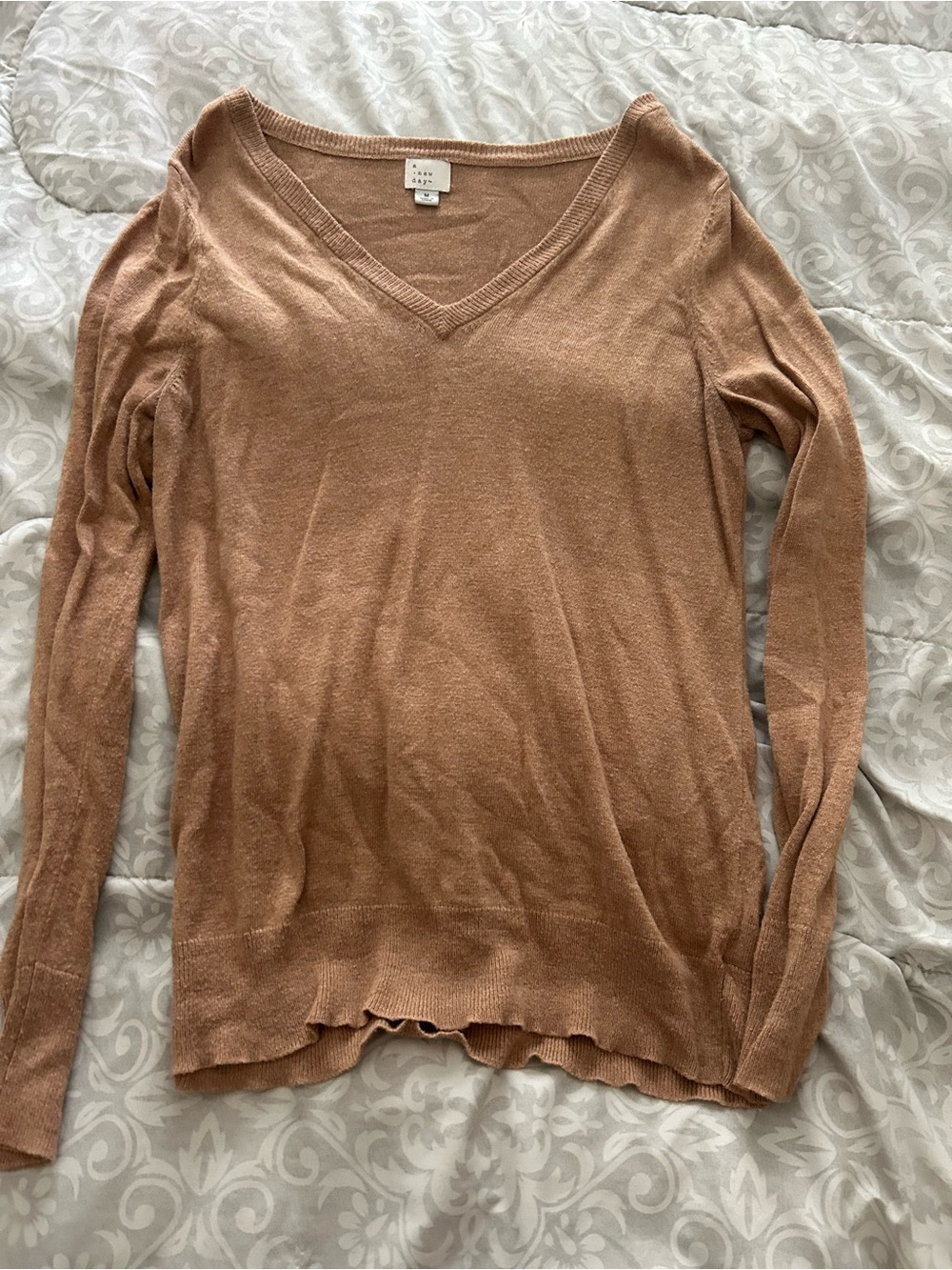A New Day sweater